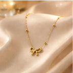 DropKart | Women's Elegant Gold Bow Pendant Necklace